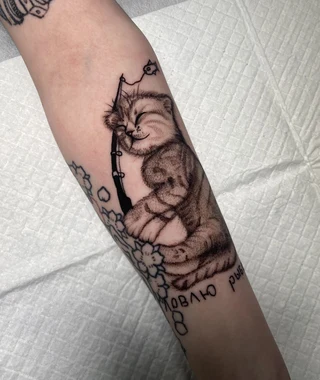 Александр — Кот — деталь татуировки